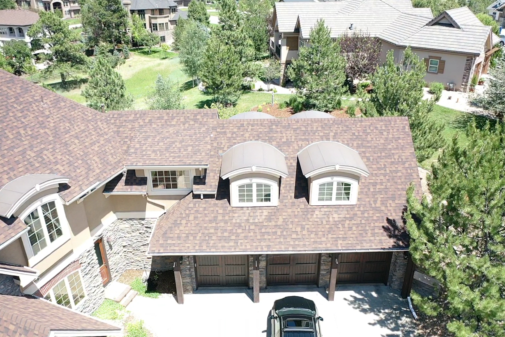 A home with a shingle roof