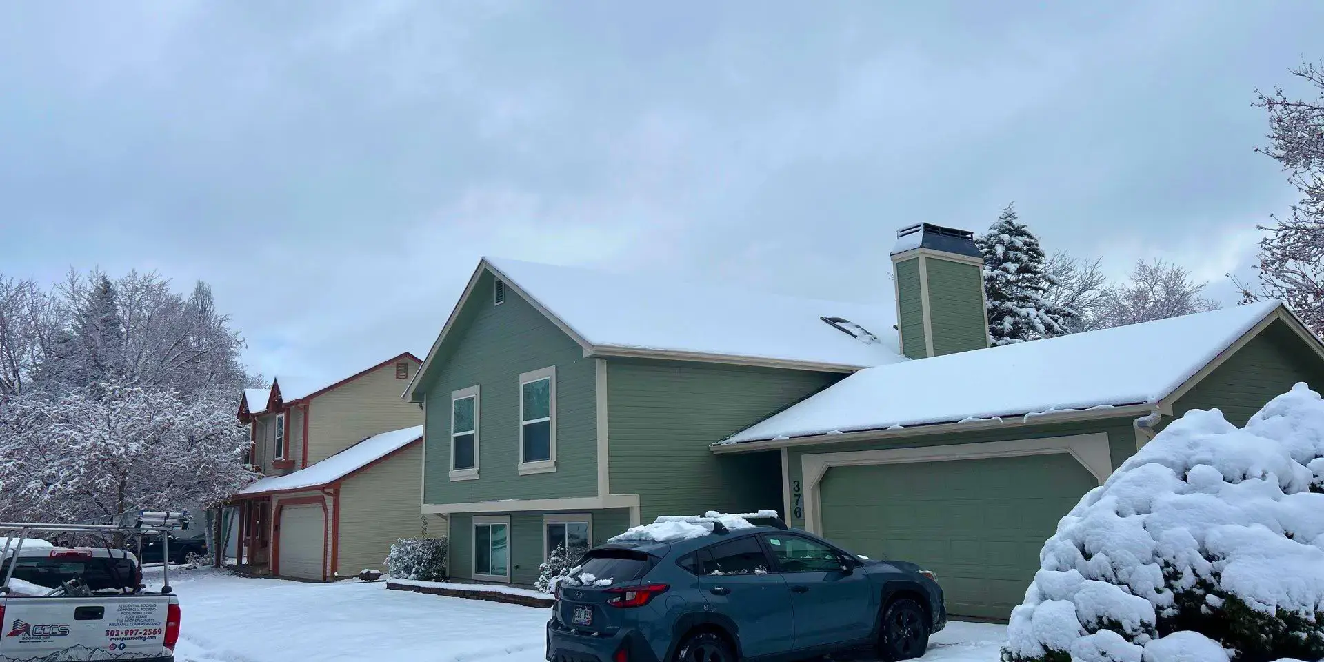 Residential home in Littleton, CO covered in fresh snow.