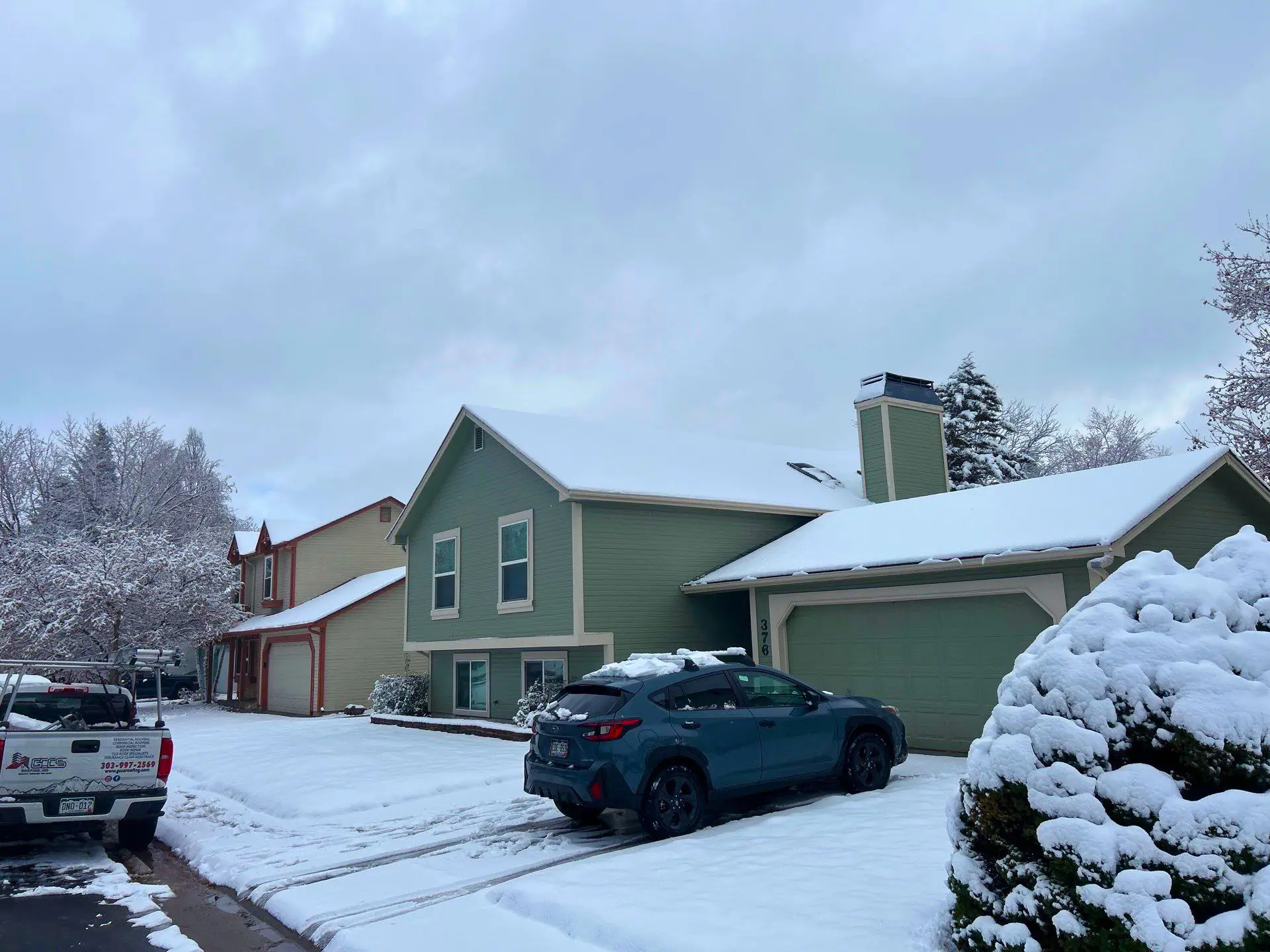 Residential home in Littleton, CO covered in fresh snow.