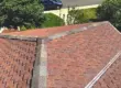 View from rooftop showing asphalt shingle patterns