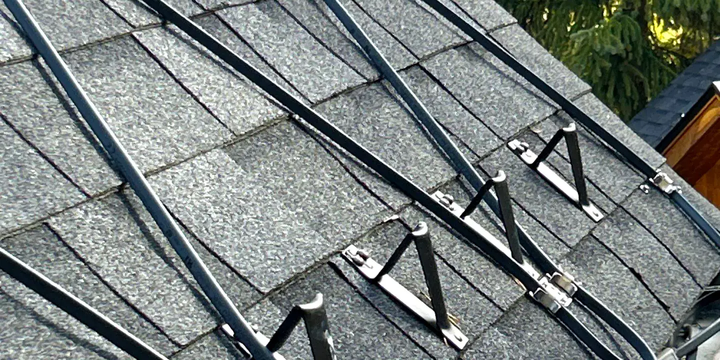 c627f8db-7017-4198-a976-b0b4d06b376a Roof with asphalt shingles and installed Hot Edge Sytem to prevent ice dams in winter.