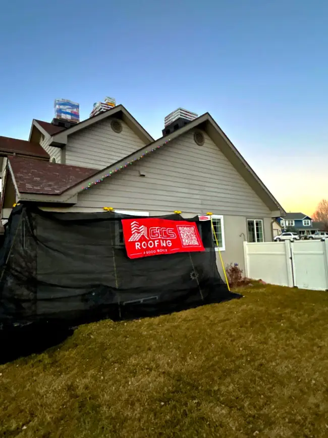 Residential home in Colorado undergoing roofing work