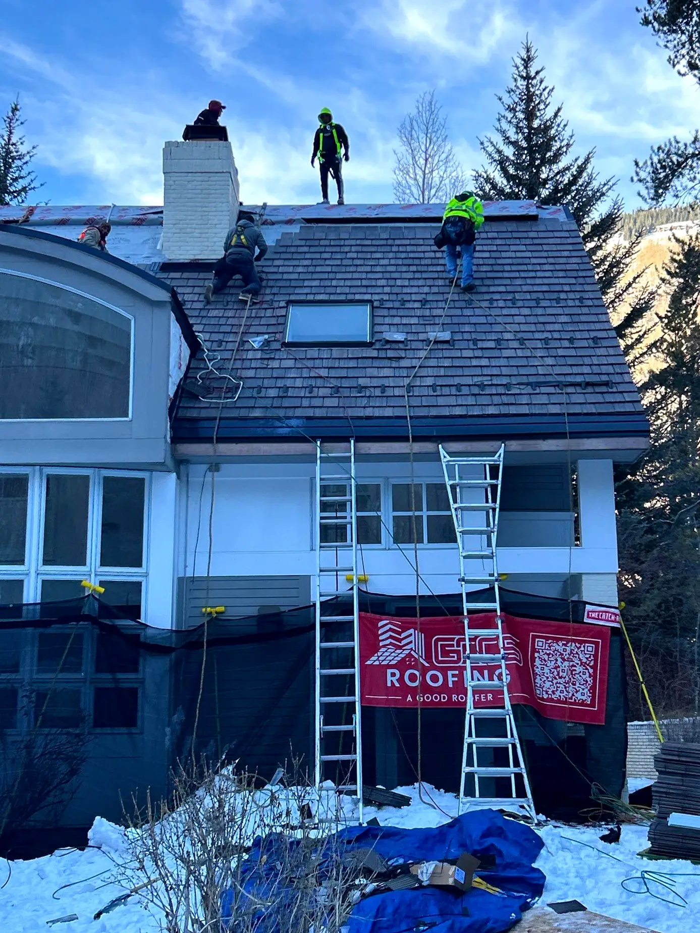 GCCS Roofing, LLC team of professional roofers performing a residential roofing installation and roof repair in Littleton, CO