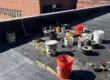 Flat roof repair work on a commercial building