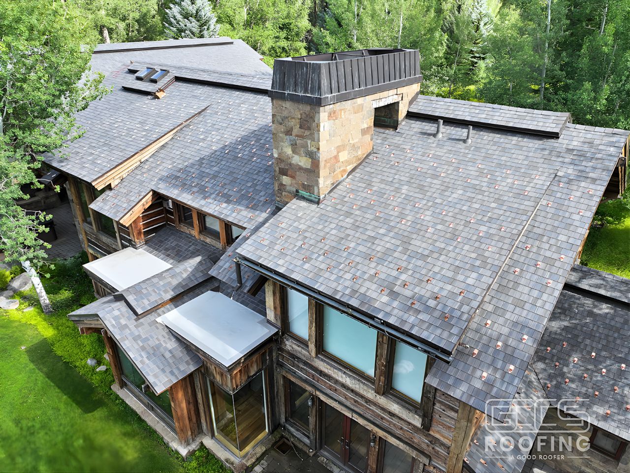 Aerial view completed luxury mountain home roof replacement Vail Valley Colorado