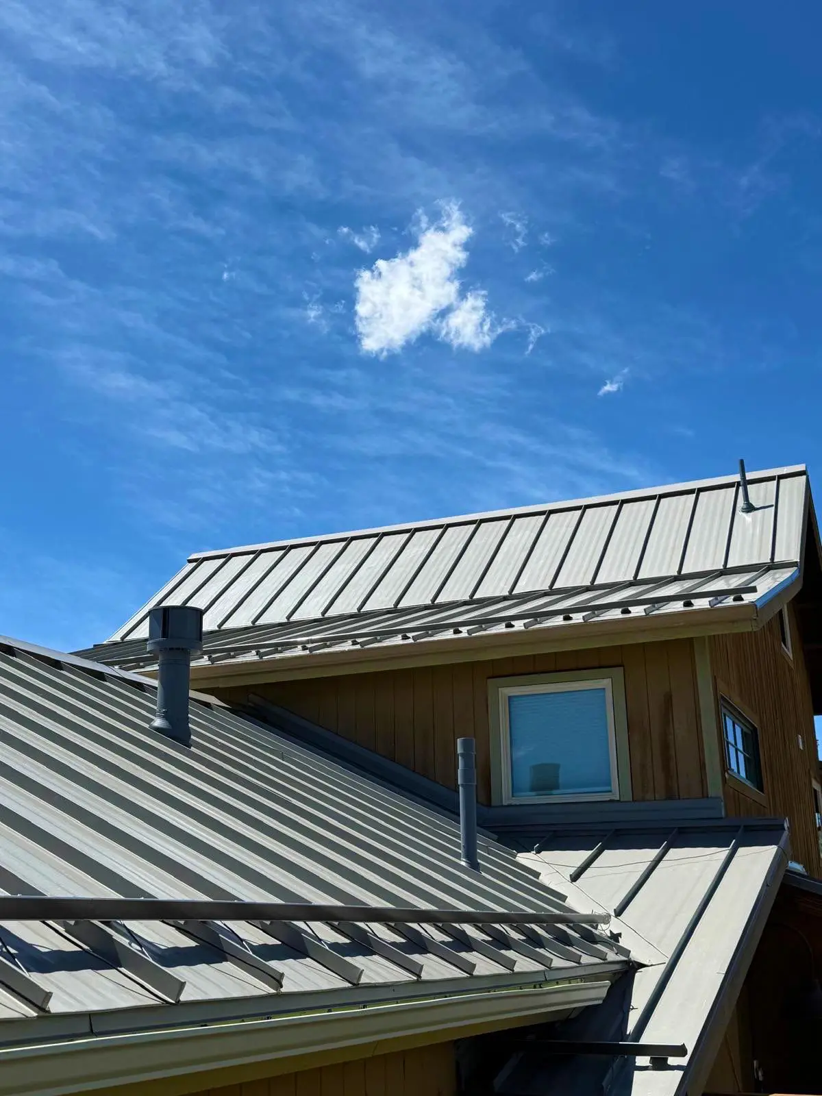 Standing seam metal roofing on a residential property